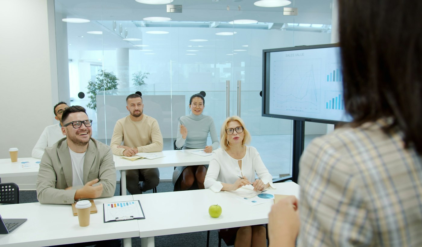 People listening during a presentation in a meeting room